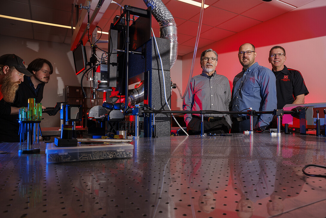 George Gogos, Craig Zuhlke and Jeffrey Shield are part of a $9.2 million grant awarded by the Department of Defense to a team headed by Northrop Grumman Corp. The goal of the research is to create smaller, scalable 3D stacks of chips and heat transfer technologies that will help regulate thermal management in those structures. At left are graduate students Josh Gerdes and Andrew Butler.