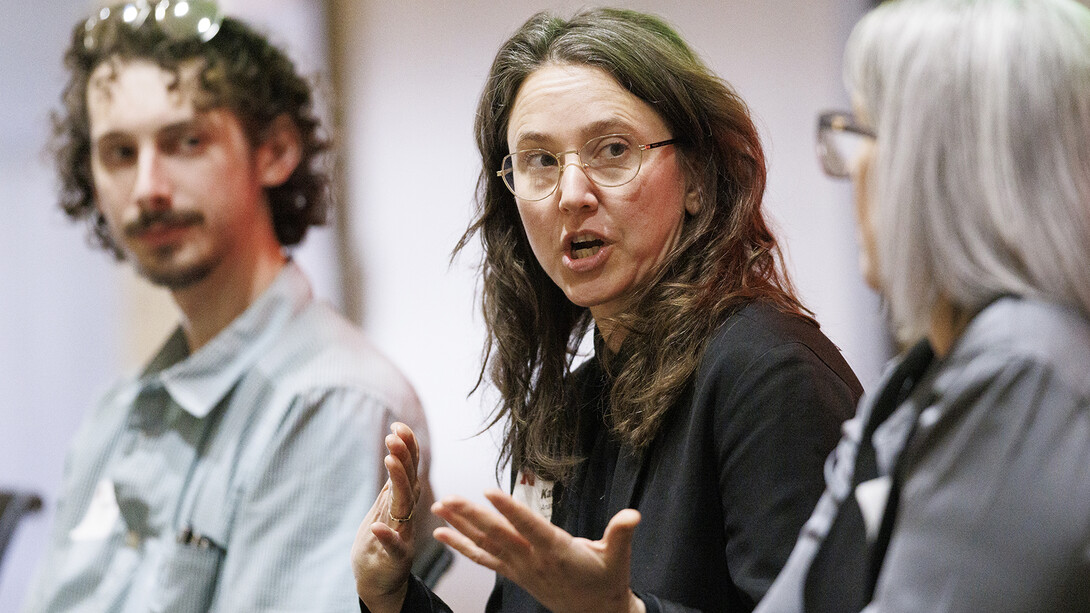 Katie Anania, assistant professor in the School of Art, Art History and Design, talks during the afternoon panel discussion.