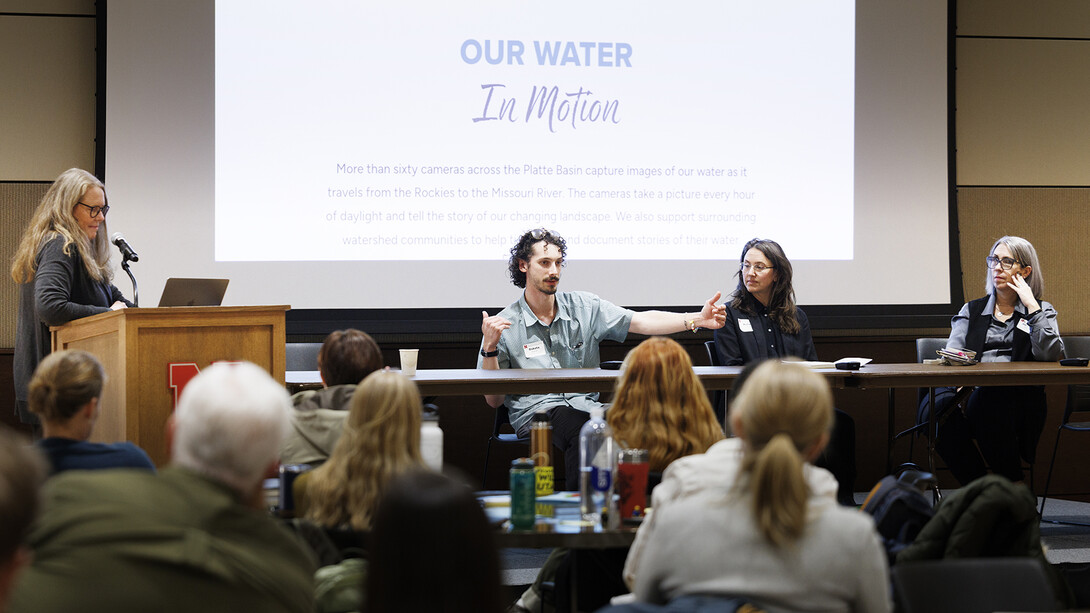 Dakota Altman with the Platte Basin Timelapse talks during the symposium's afternoon panel discussion.