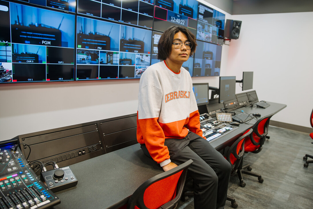 Jay Quemado is photographed in the broadcasting studio.