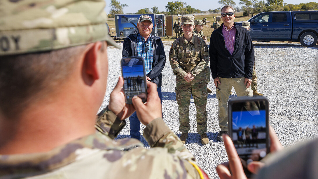 Cadet Jenny Goesch poses with Biological System Engineering professors Aaron Mittelstet, left, and Alan Boldt. 