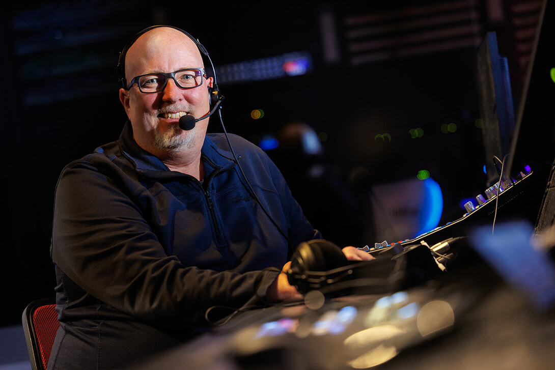 Jamie Wenz, technical director in the College of Journalism & Mass Communications,  sits in the Don and Lorena Meier Studio ahead of Nebraska Nightly’s final show of the year.