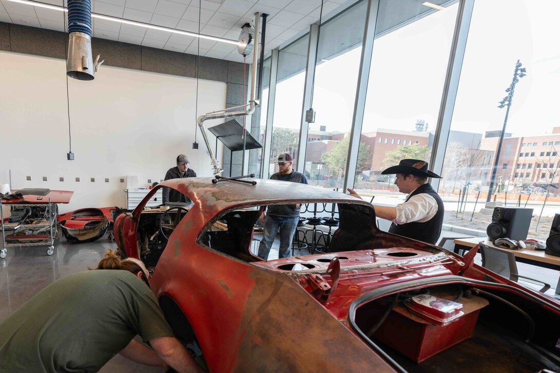 Figure 8 Racing, a registered student organization at UNL, meets in Kiewit Hall to work on their 1980 Pontiac Firebird as they get it ready for the 2025 racing season. March 25, 2025. 