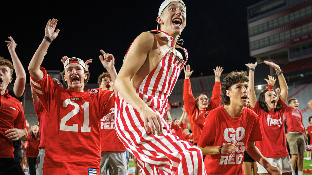 Students celebrate inside Memorial Stadium.