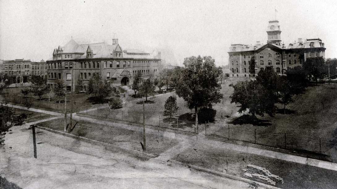 Looking north from R Street, this undated photo shows two of the earliest buildings on the University of Nebraska's original four-block campus — Architecture Hall (at left), which was originally a library, and University Hall (right). University Hall, the first building on campus, was demolished in 1948. Architecture Hall, built in 1892, is the oldest structure on campus.