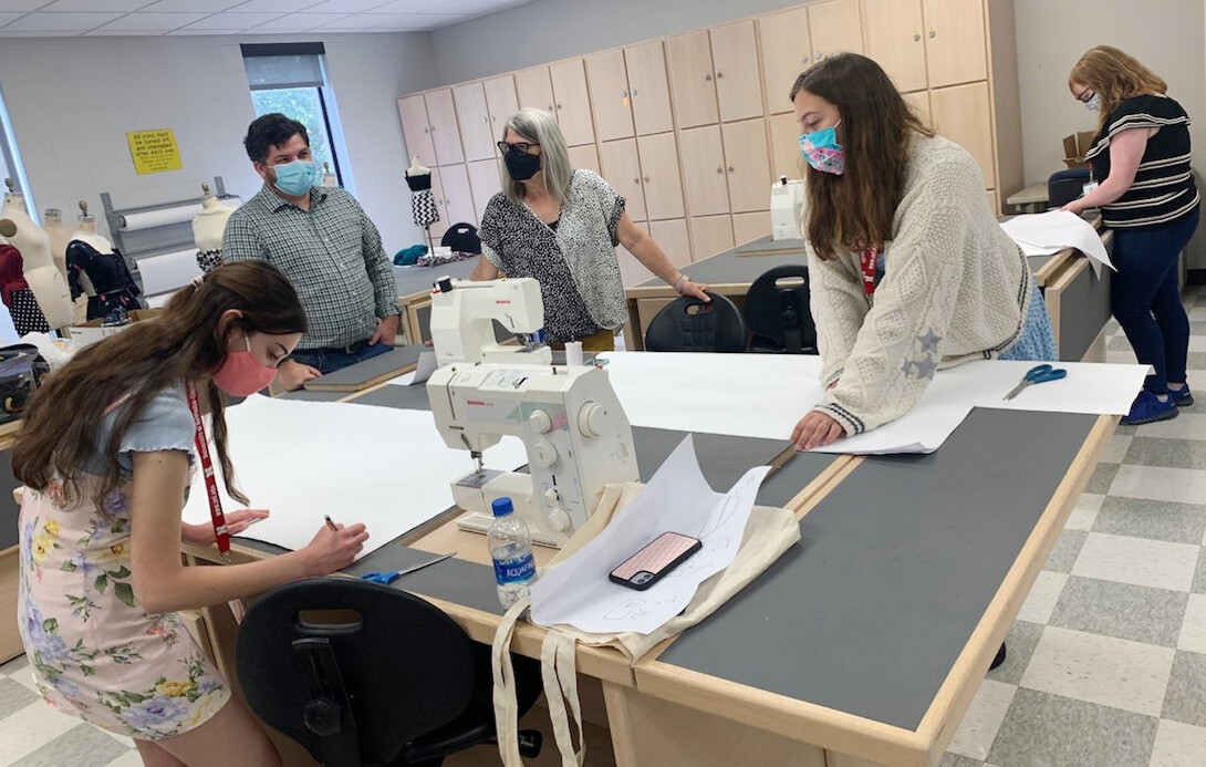 Sandra Starkey (center) leads a session during the Big Red Summer Academic Camp, "Discover Sustainable Fashion."