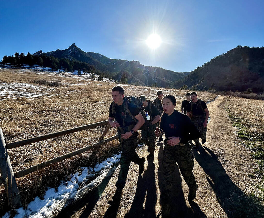 Members of the University of Nebraska–Lincoln's Naval ROTC endurance team race at the Colorado Drill Meet.