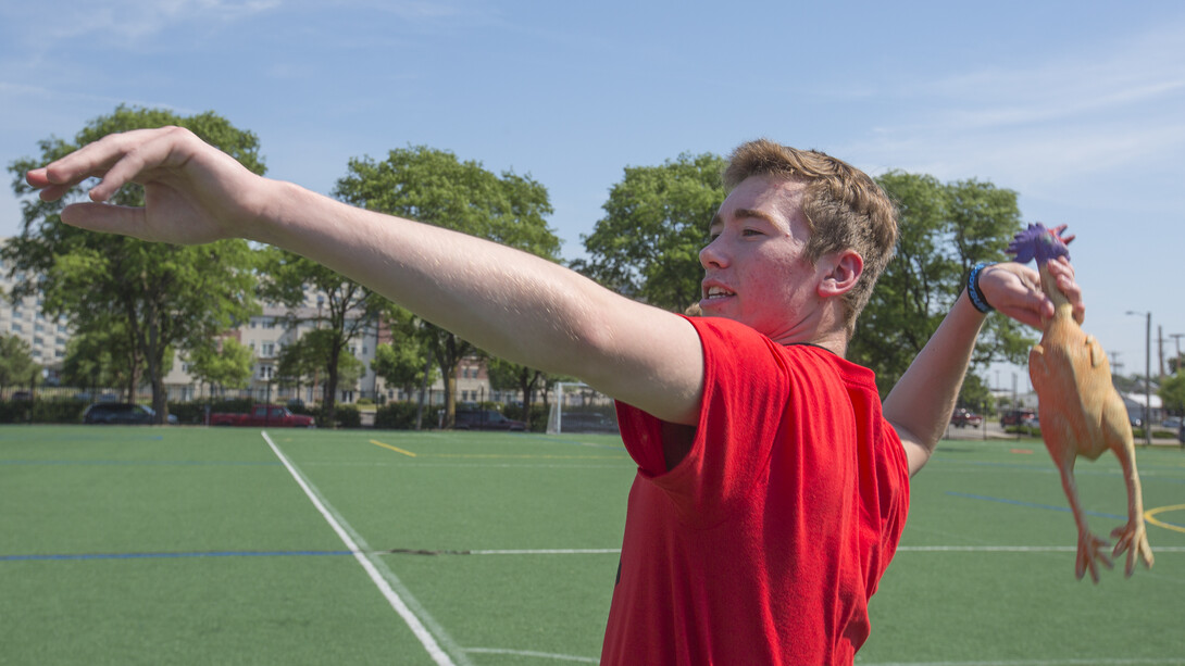 Gareth Stauffer of Loomis, Nebraska, prepares to throw a rubber chicken during a team building activity offered as a part of New Student Enrollment's Power Up Weekend. Changes made to the program two years ago have resulted in attendance growth, from 120 in 2014 to 350 this year.