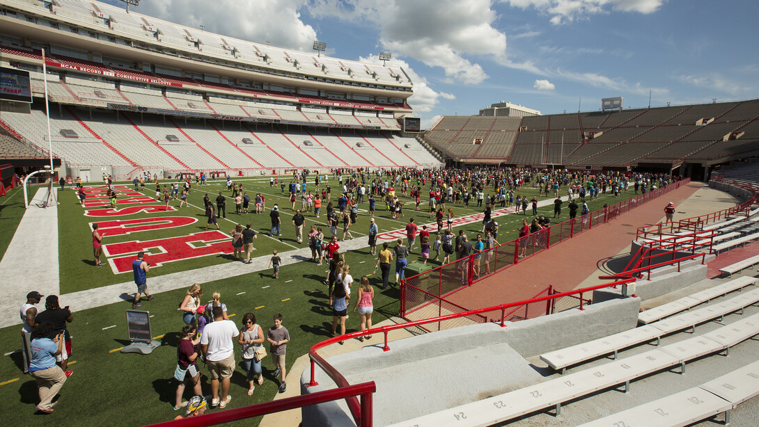 In two hours, more than 3,700 Pokémon Go trainers ventured into Memorial Stadium seeking the digital creatures that appear in the new and phenomenally popular smartphone app.