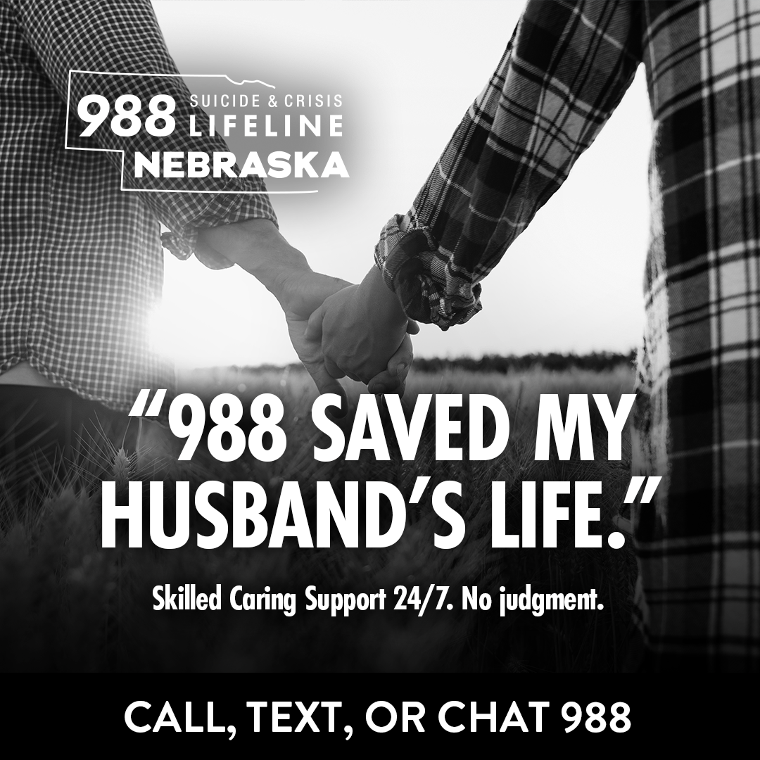 An ad from a suicide prevention campaign reads "988 saved my husband's life."