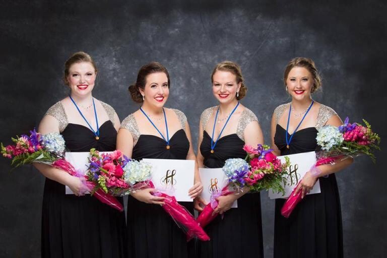 Jadyn Johnson (far right) is part of Adrenaline, an award-winning barbershop quartet.