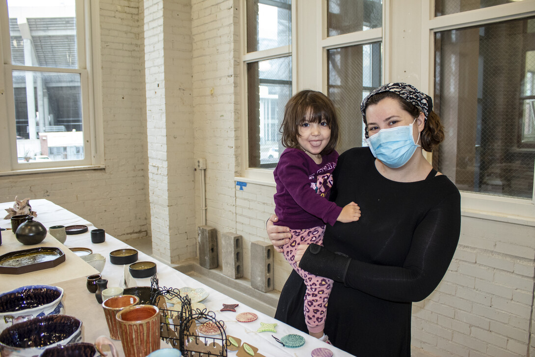Angela Kent holds her daughter, Lily.