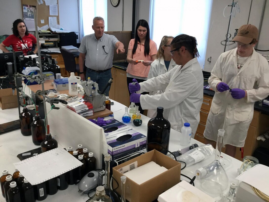 Students work in a lab.