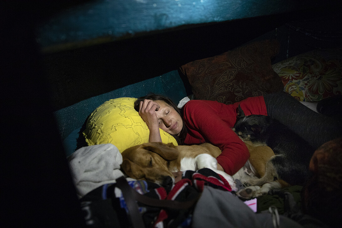 Kristina cuddles her dogs whenshe goes to sleep at night. "My dogs are everything, really," she said. "They're my kids. They're my family. They're my support group."