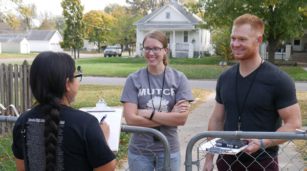 Nebraska graduate students conduct a door-to-door survey of Lincoln residents. The survey results were used to create a database that can be used by community planners for neighborhood improvements.