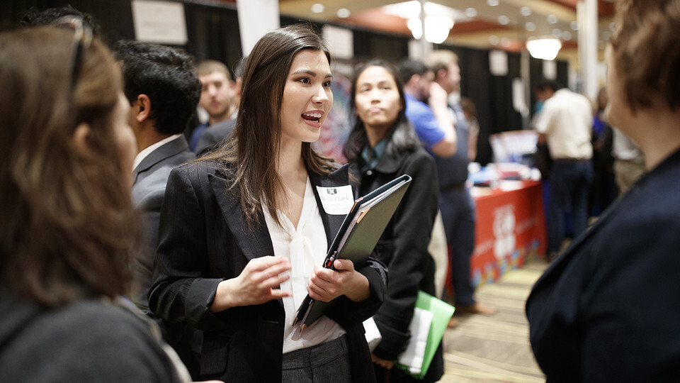 Sarah Clark, senior in computer science, talks with a recruiter during day two of the spring 2019 Career Fair. | Craig Chandler, University Communication