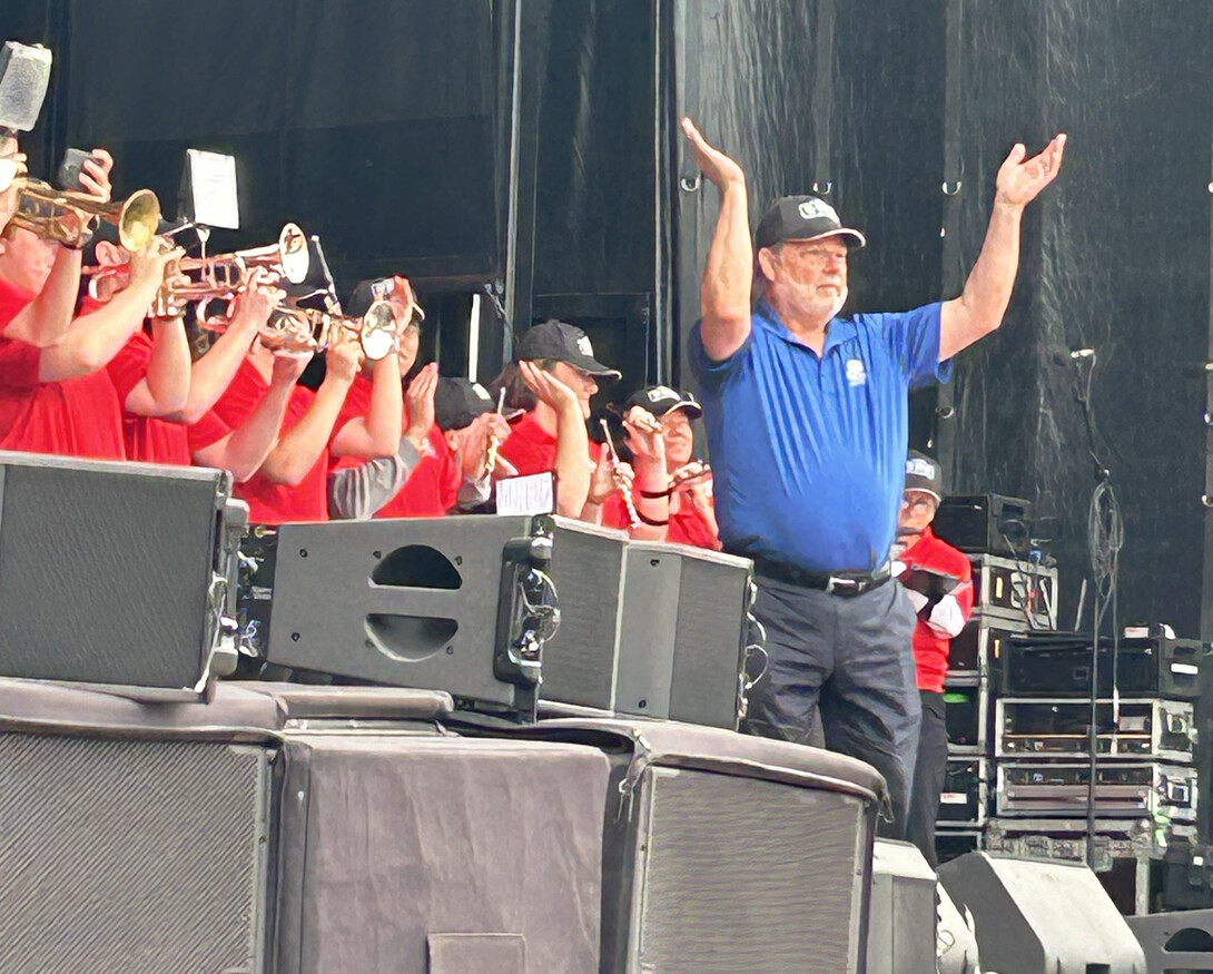 Tony Falcone directs the band at D-Day commemoration