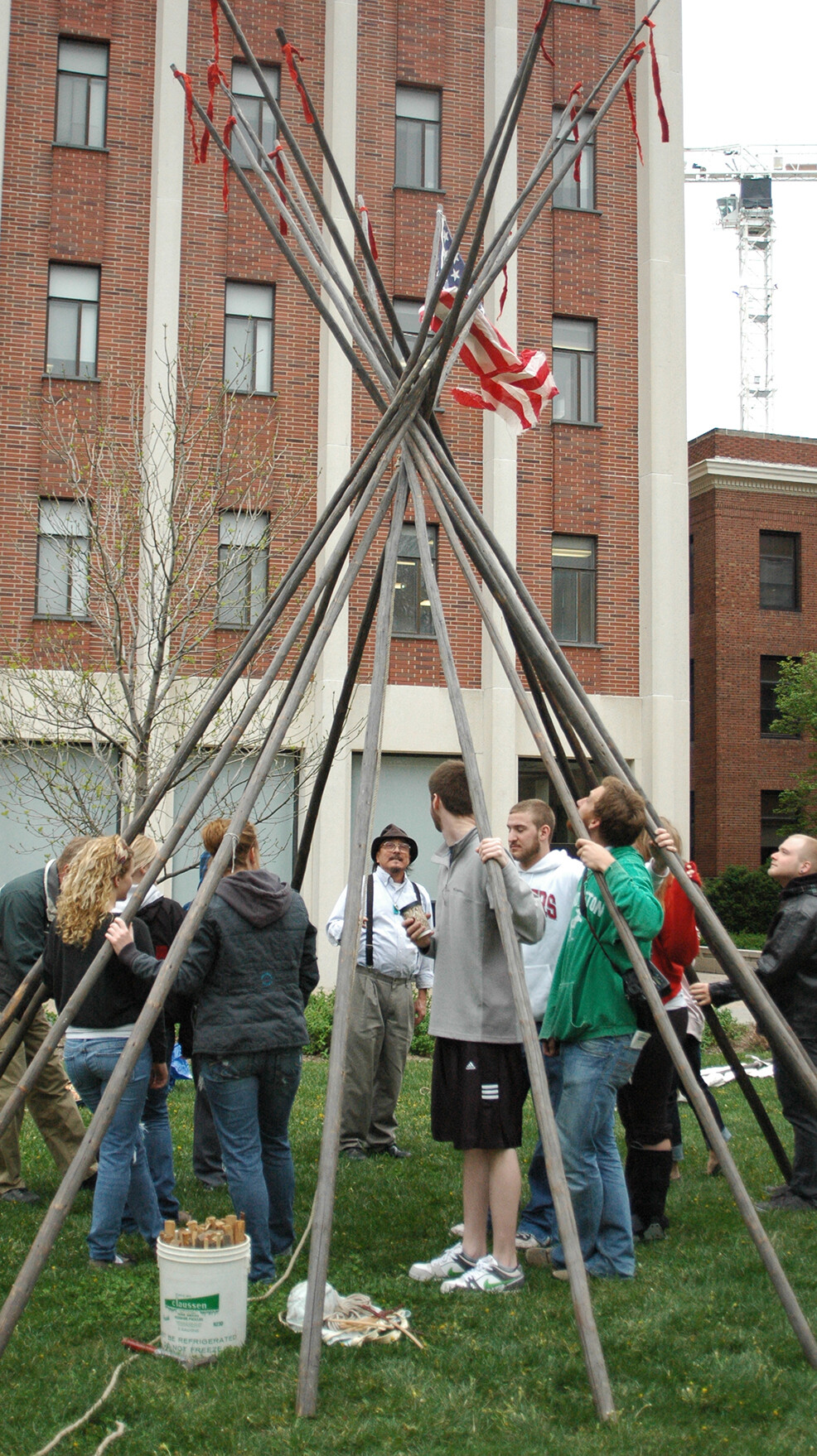 Students led by UNL's Mark Awakuni-Swetland set up a tipi outside of Oldfather Hall in April 2012.
