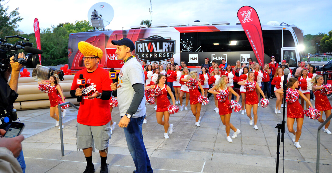 CNN Headline News' Carlos Diaz and Bob Van Dillen broadcast live from the Nebraska Union Plaza on Oct. 4. The broadcast was part of Headline News' "Morning Express with Robin Meade" program.