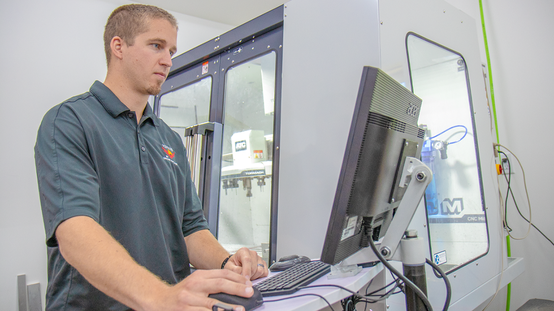 Jim Higgins, chief engineer and Nebraska alumnus, works on a drone system prototype. The company has also hired University of Nebraska–Lincoln undergraduate students to work as interns.