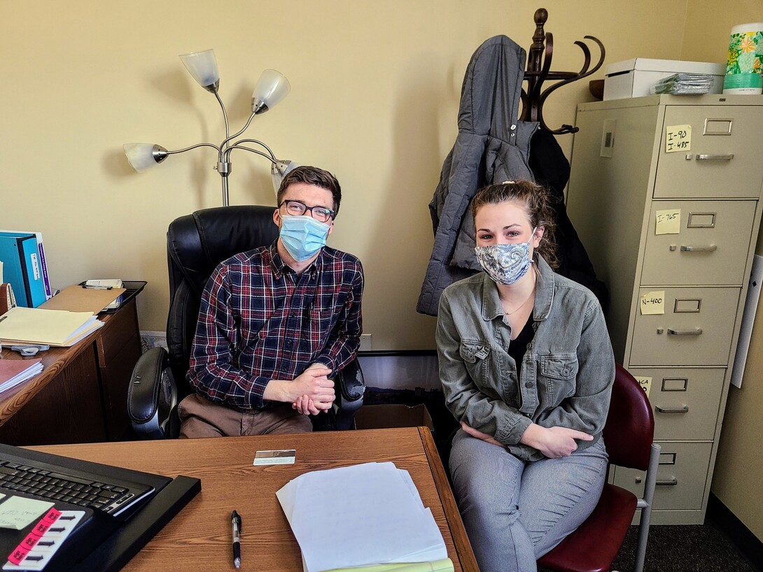 Emma Mays (right) with her internship supervisor Drew Miller, Director of Immigration at Catholic Social Services of Southern Nebraska.