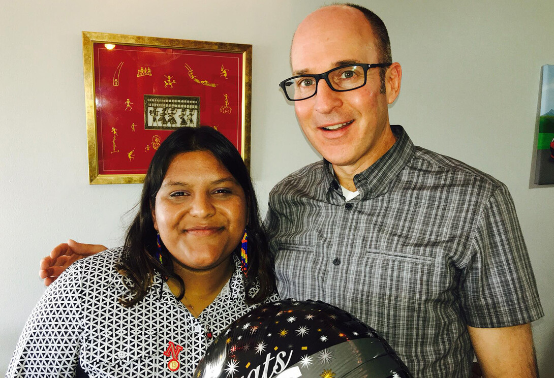 Dave Fitzgibbon stands with Aakriti Agrawal, a student he befriended during a video shoot. The two maintained a friendship through Agrawal's academic career. That connection continued through the start of her career.