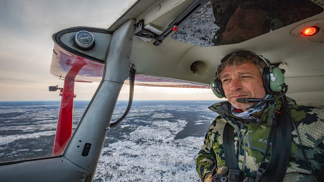 Michael Forsberg in the small plane he used to follow the migration patterns of whooping cranes, the subject of his book.