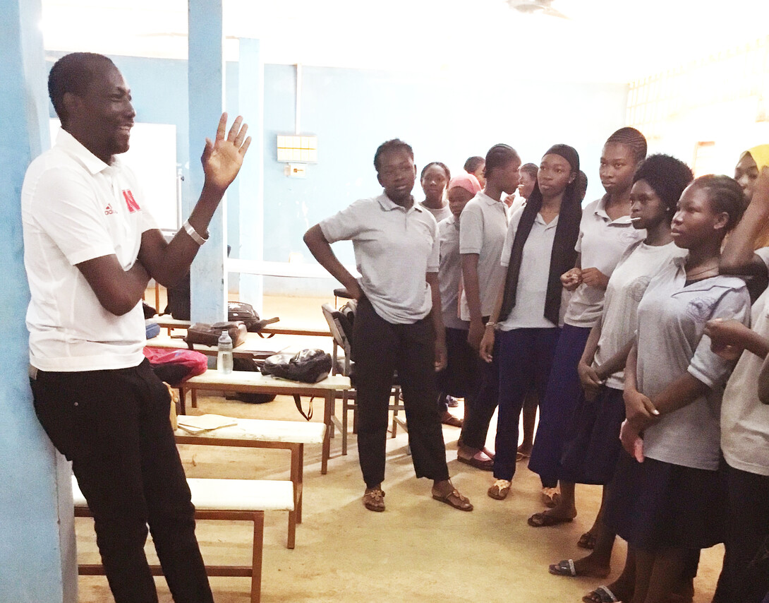 Malgoubri, left, speaks to participants in his recent workshop on education practices regarding multilingual learners.