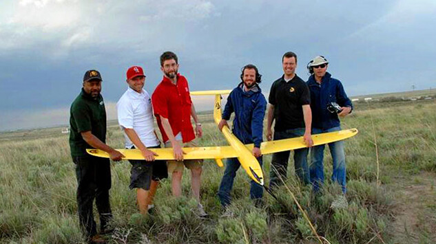 UNL's Adam Houston (third from left) stands with members of the Vortex 2 unmanned aircraft system group and the Tempest unmanned aircraft. Houston is an associate professor of atmospheric sciences at UNL.