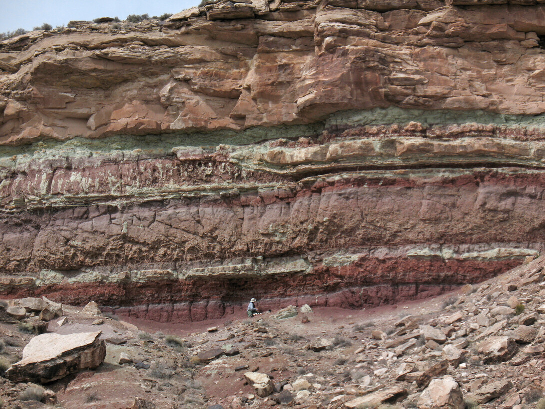 Matt Joeckel, Conservation and Survey Division director, is seen mapping the Yellow Cat Formation of the Cedar Mountain Formation in Utah. | Photo courtesy Jim Kirkland, Utah Geological Survey