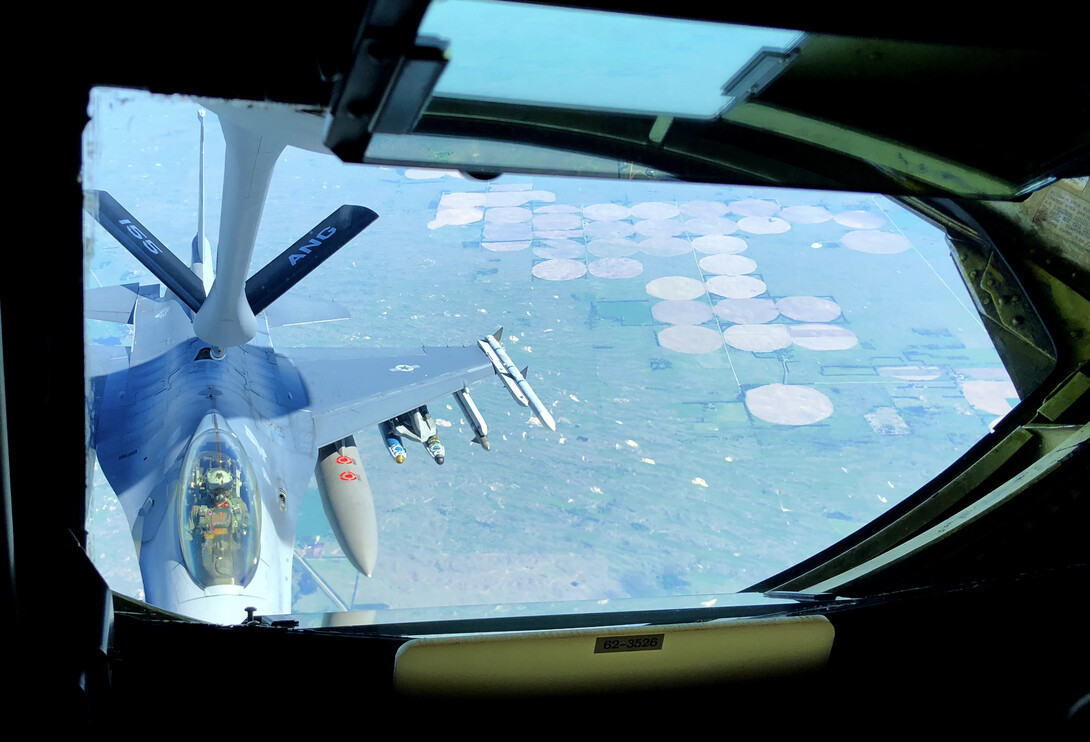 An South Dakota National Guard F-16 refuels at 35,000 feet over the Cornhusker State during the May 24 civic leader flight led by Nebraska's 155th Air Refueling Wing.