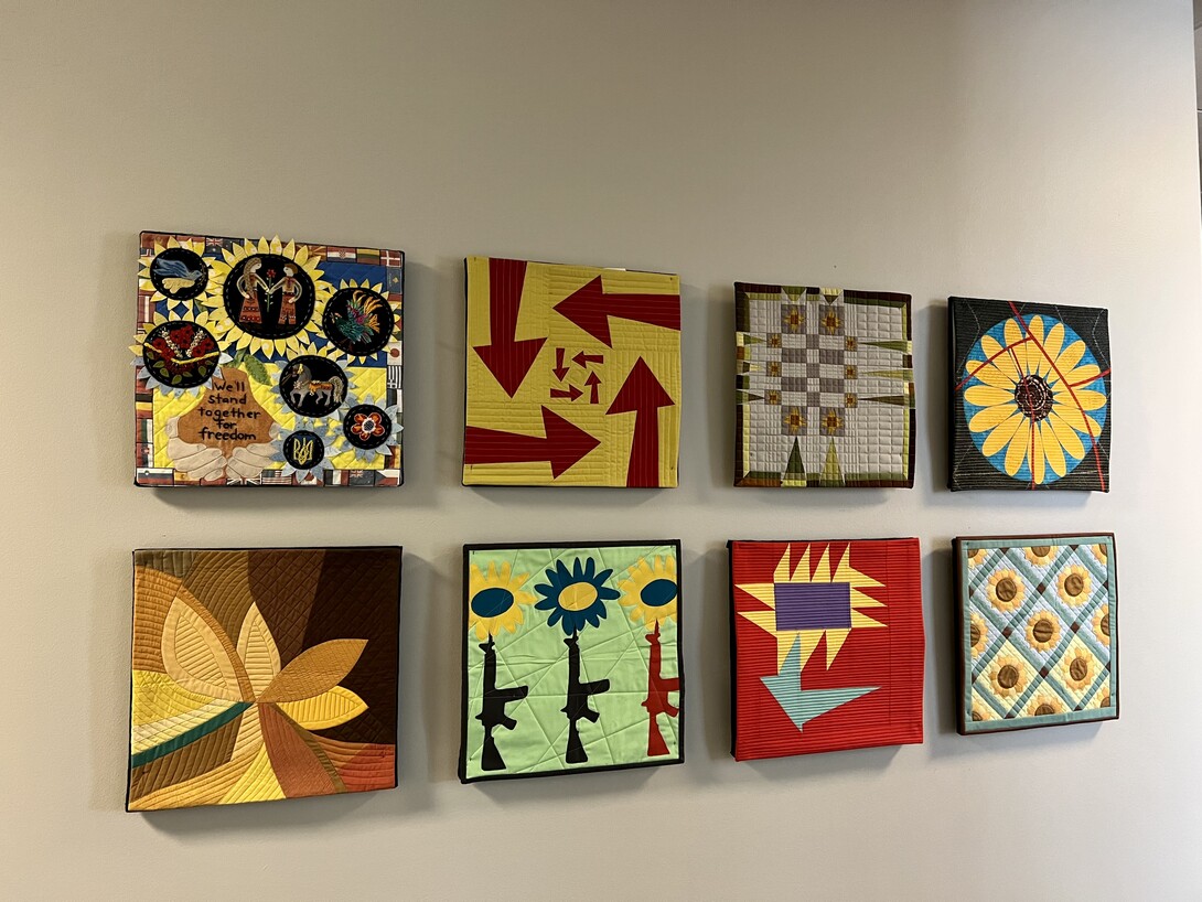 Sunflower Mini-Quilts - including Thomas Knauer's "Sunflowers in Wartime" - second one on the bottom 