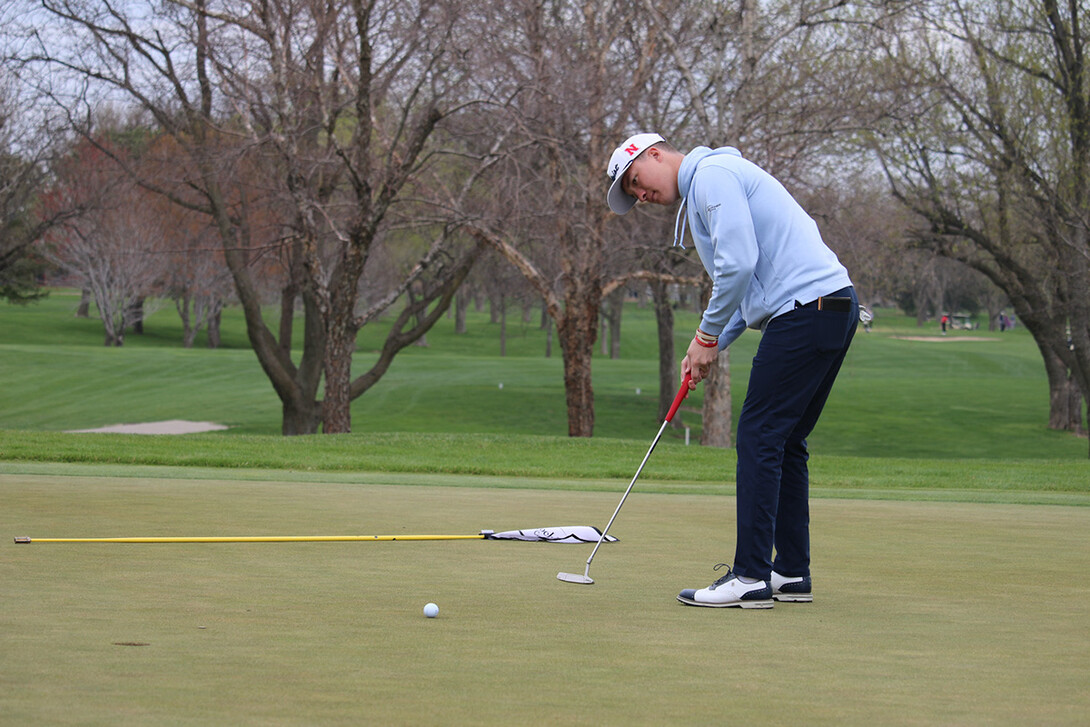 Koby Head putts on a green at Hazeltine National Golf Club in Chaska, Minnesota.