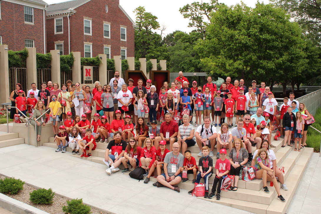 Participants in last year's Future Husker University gather in the Wick Center's Holling Garden.
