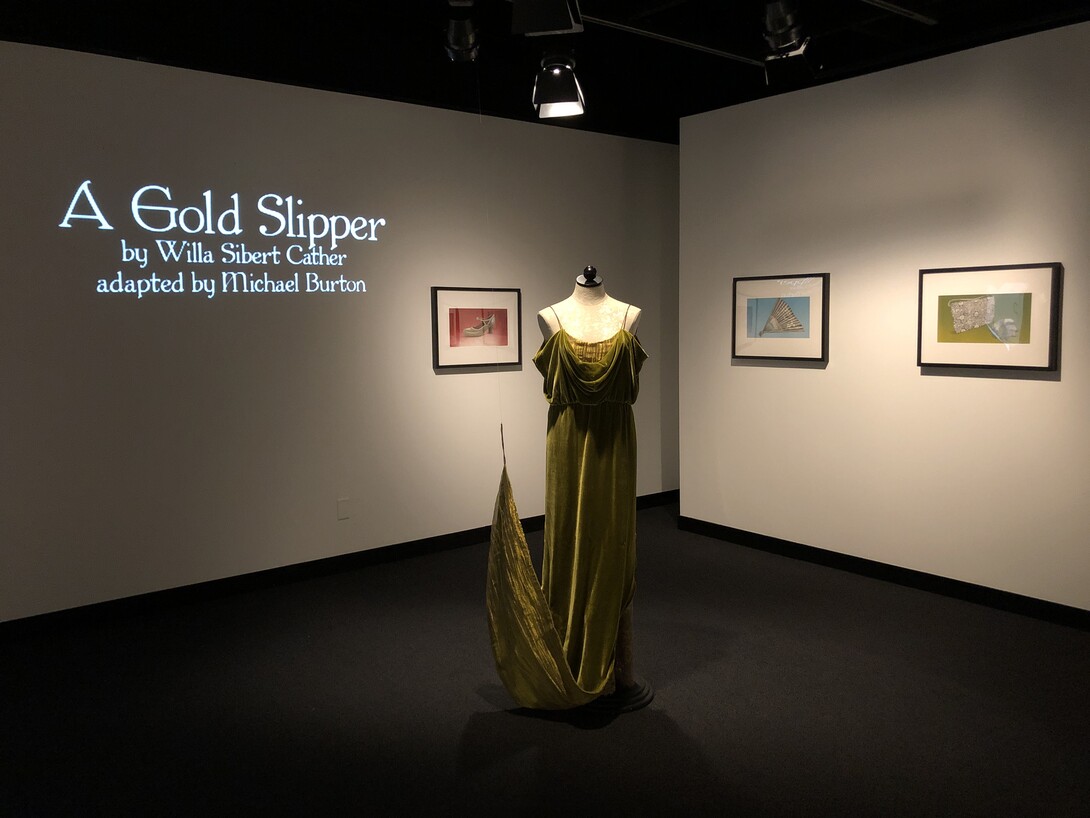 A green velvet dress based on Willa Cather's writing is part of the exhibition "A Gold Slipper," on view through Jan. 21 at the Robert Hillestad Textiles Gallery.