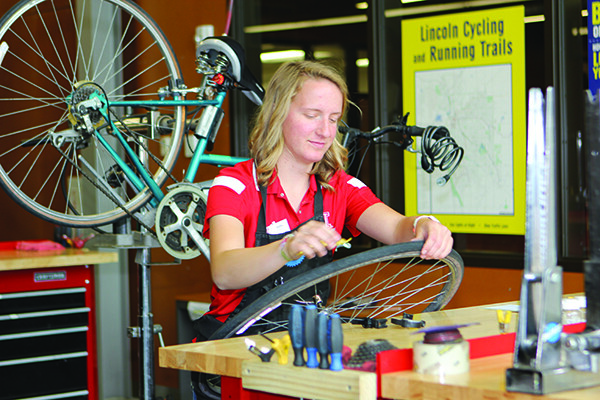 Topics include patching a flat, basic brake and derailleur adjustments, riding position/bike fit and layering for winter commuting.