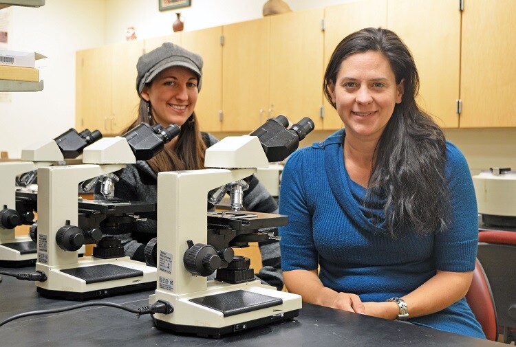 Johnica Morrow (left) and Elizabeth Rácz, doctoral students, are co-authors of a paper that examines the parasitology found in archaeological sites in Nivelles, Belgium. (Mekita Rivas | Natural Resources)