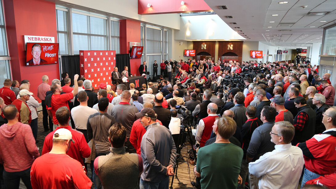 Media, university officials, Husker athletics staff and former Husker football players gather in Memorial Stadium to hear the Dec. 3 announcement that Scott Frost is Nebraska's new head coach for football.