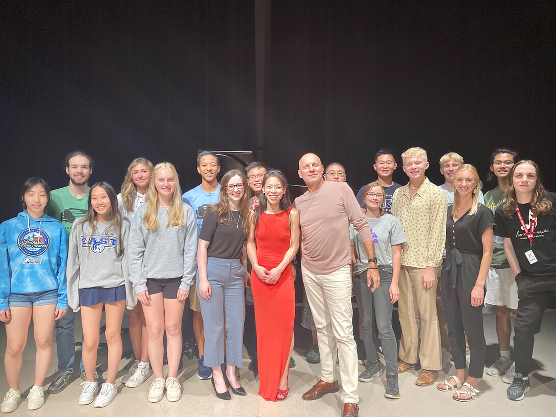 Paul Barnes with previous Lied Center Piano Academy participants after the final concert.