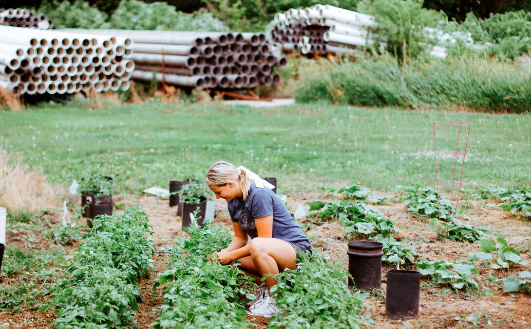 Husker senior Lily Woitaszewski tends to her family's garden in Wood River, Nebraska.