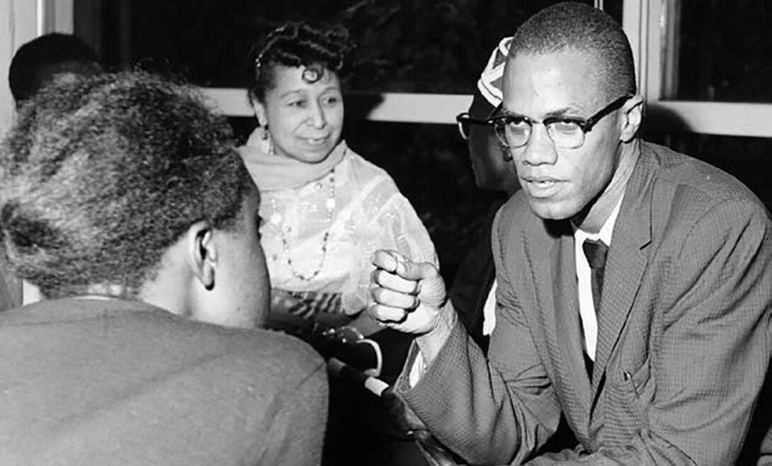 Malcolm X, likely at a welcoming event for the African-American Students Foundation in 1959 or 1960