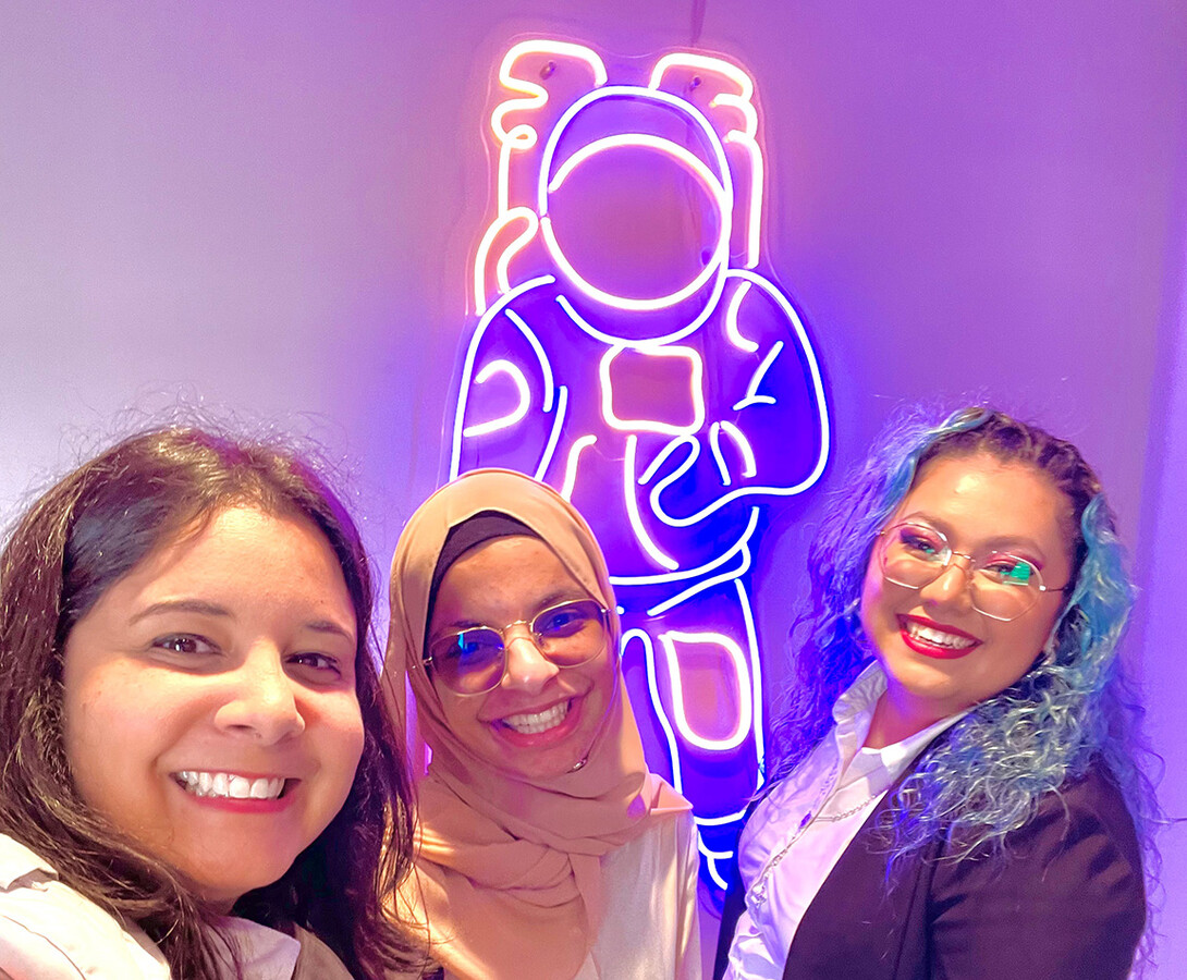 Al-Hamedi (center) snaps a photograph with Joan Melendez Misner, a NASA engineer (left), and Dulce Chavez Trejo, a senior in mechanical engineering at Nebraska, who was also a NASA Space Grant Fellow. 