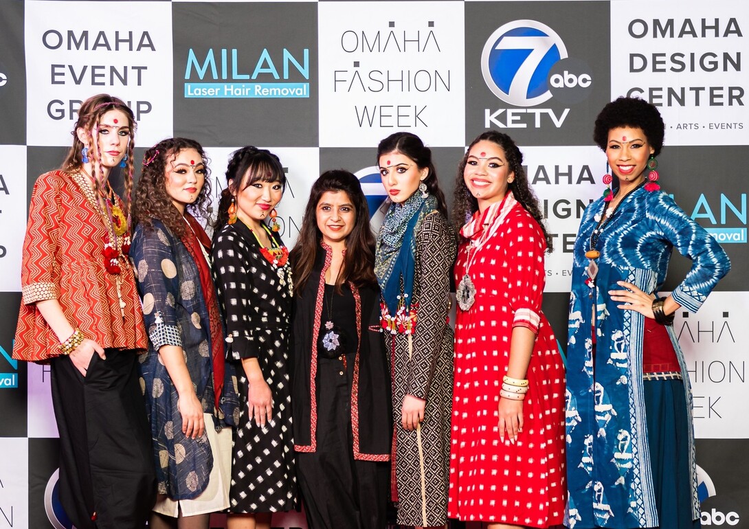 Ritu Jadwani (center) with the six handcrafted looks she showcased at Omaha Fashion Week. (Credit: Omaha Fashion Week)