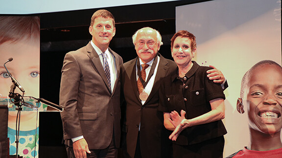 Samuel Meisels (center) poses with University of Nebraska President Hank Bounds (left) and Andy Holland, president of the Holland Foundation, after being named the Holland Presidential Chair.