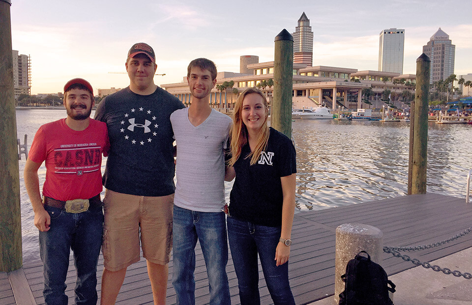 Rodger Farr (from left), Shawn McDonald, Kolby Grint and Samantha Teten stand in front of the Tampa Convention Center during the 2017 Society Annual Meeting.