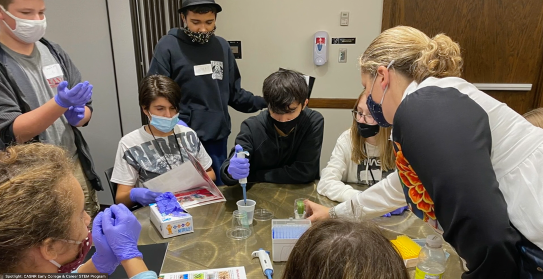 Lincoln Northeast students conduct an experiment as part of the university's Early College and Career STEM program.