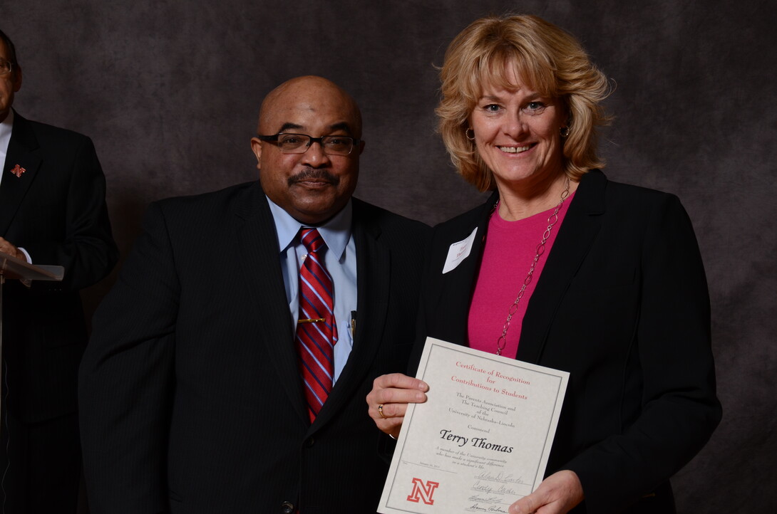 Terry Thomas (right), a volunteer with the University Health Center, receives a contribution to students awards during the 2015 ceremony in the Nebraska Union. The 2016 ceremony is 3 to 5 p.m. Jan. 29 in the Nebraska Union.