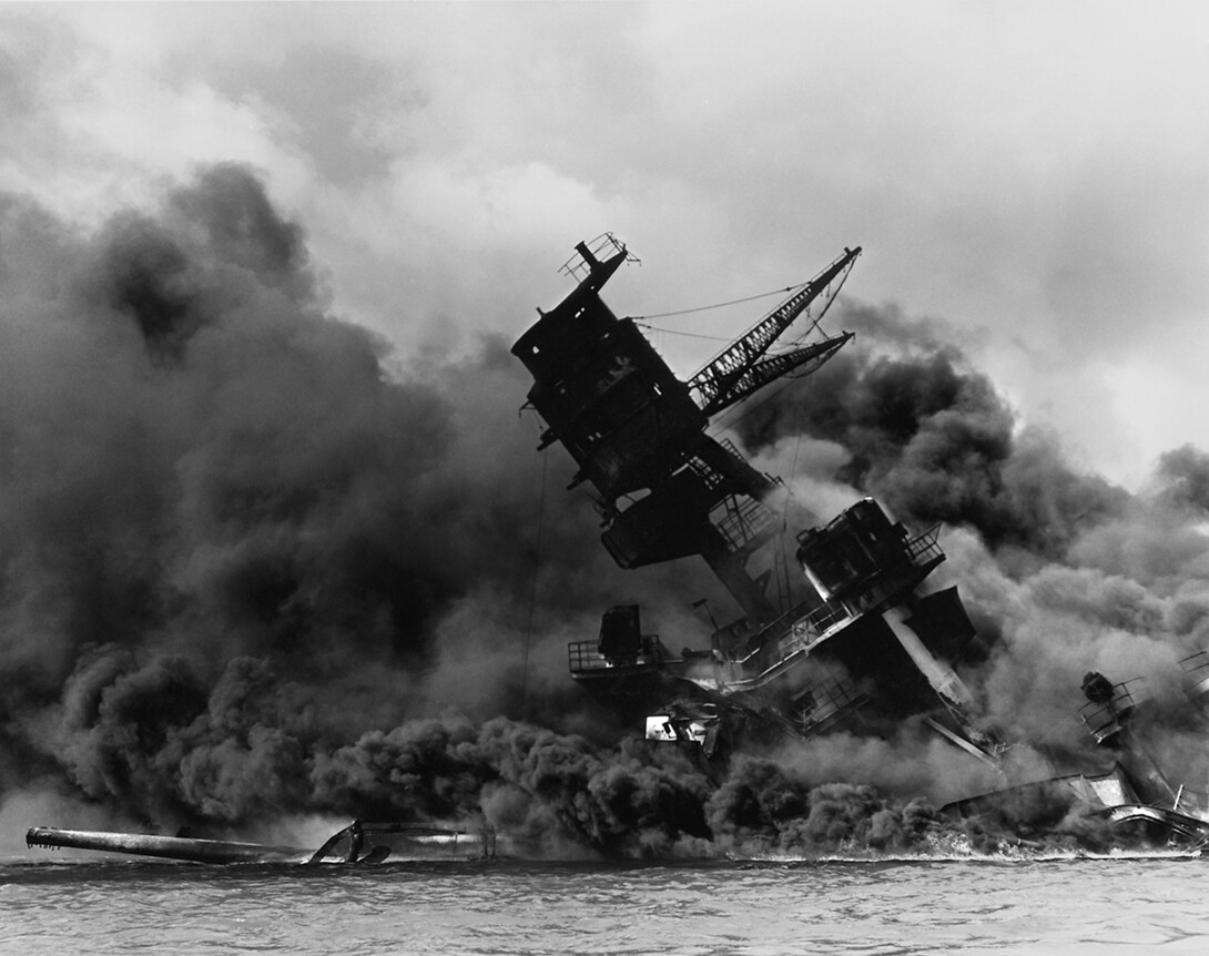 The USS Arizona burns shortly after being hit by a bomb during the attack on Pearl Harbor on Dec. 7, 1941.