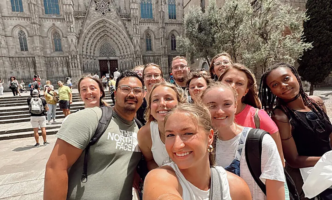 Valerie Uehling (center) takes a photo with her group in Spain.