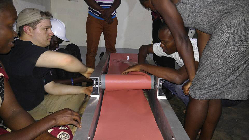 UNL students planned, designed and built a machine that flattens used drinking straws mechanically, streamlining a process formerly done by hand. Workers at Kinawataka Women Initiatives, the organization receiving the machine, then weave the flattened straws into bags, mats, jewelry and other retail items. 